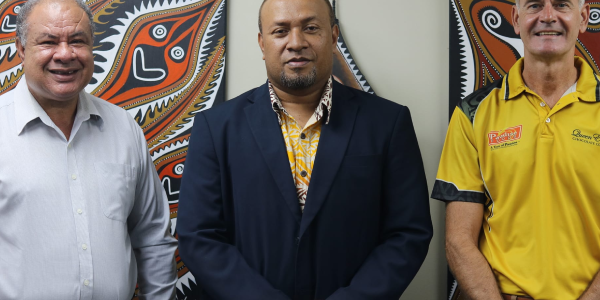 HE Soaki, center, with Michael Penrose (left), Group Chief Executive Officer (CEO) for Paradise Foods Limited and Roger Harwood (right), General Manager (GM) Marketing.