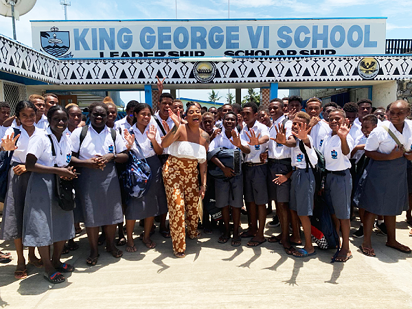 Tenelle pose with the King George Sixth students.