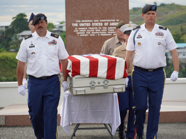 US defense Agency procession of the US Marine casket.