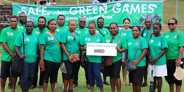 Permanent Secretary Dr Samson Viulu, (standing centre-back row) with MRD staff representing the Ministry of Rural Development at the inaugural launching of ‘Safe, Green Games’ Campaign after the official ceremony at Lawson Tama Stadium.