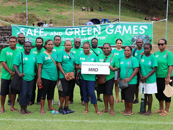 Permanent Secretary Dr Samson Viulu, (standing centre-back row) with MRD staff representing the Ministry of Rural Development at the inaugural launching of ‘Safe, Green Games’ Campaign after the official ceremony at Lawson Tama Stadium.