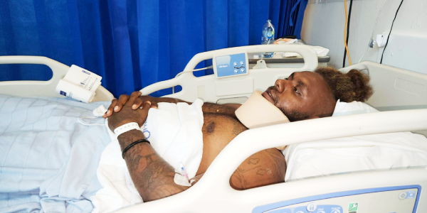 Morris Tataiora in his hospital bed suffering from spinal shock.