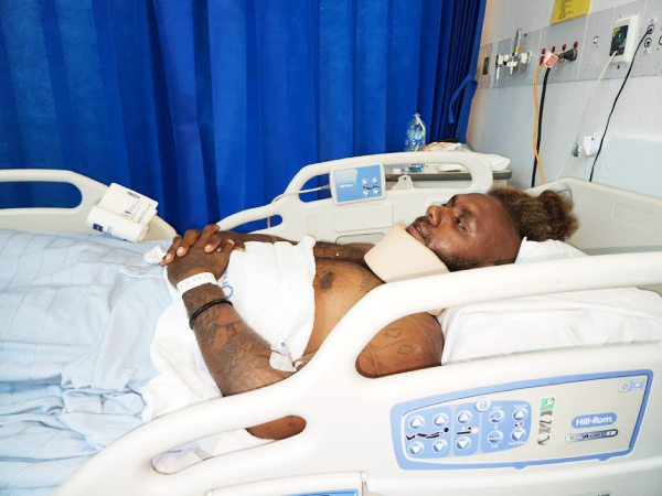 Morris Tataiora in his hospital bed suffering from spinal shock.