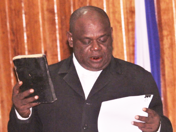 MPA for Ward 20 and Minister of Works and Transport, Jimmy Rerehe, taking his Oath of Office as a minister of Premier Fini’s Government.