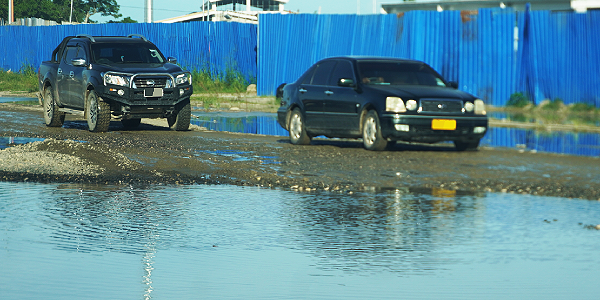 The current state of the road in front of the Pacific Games stadium at King George VI.