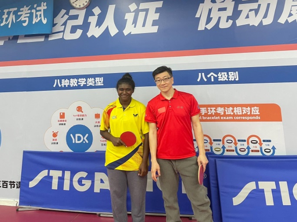 Shannon Sogavare with coach YAO.