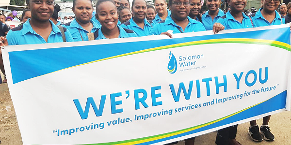 Before the parade this morning at the Honiara City Council car park, some of Solomon Water’s female staff ready for the march. Photo supplied.