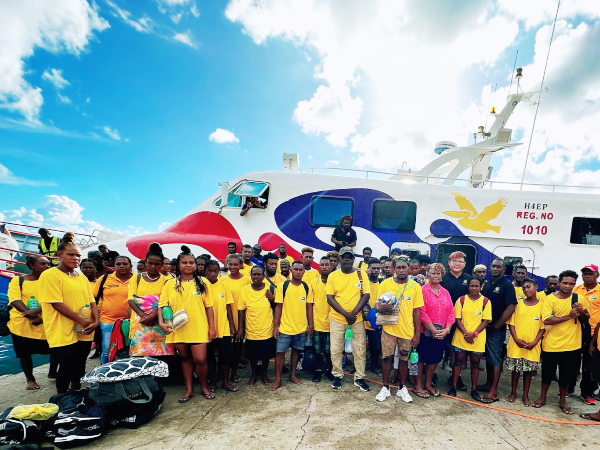TEAM Isabel with the Premier Hon Rhoda Sikilabu, Pelican Shipping Limited Manager Mr Rex and supervisor Jimsom Gua at the Buala wharf.