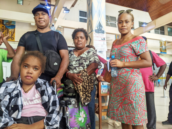 Young Rosemary (L), her parent and doctor ready to depart for Fiji last week. Photo supplied.