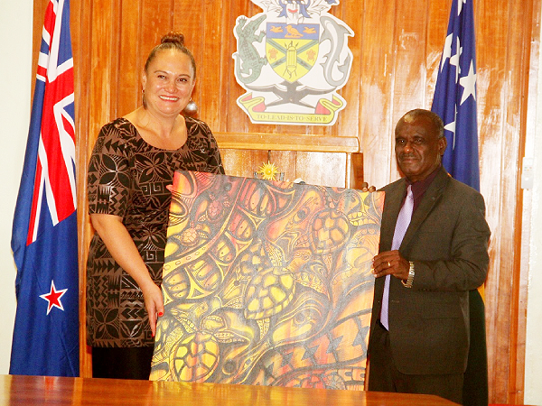 Minister of Foreign Affairs and External Trade, Jeremiah Manele presenting a gift to the Deputy Prime Minister and Associate Minister of Foreign Affairs of New Zealand, Carmel Sepuloni
