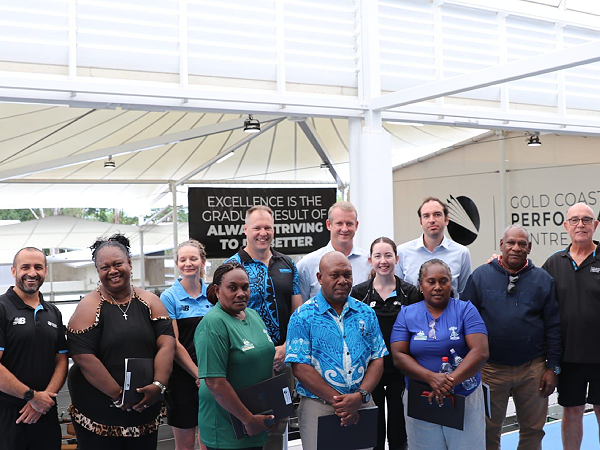 SINIS Executive Director, Aaron Alsop, High Commissioner, Rod Hilton, MID Permanent Secretary, Stephen Maesiola and OPMC National Coordinator, John Kennedy, meet with managers of the Gold Coast Performance Centre and the visiting Solomon Islands netball coach and manager.