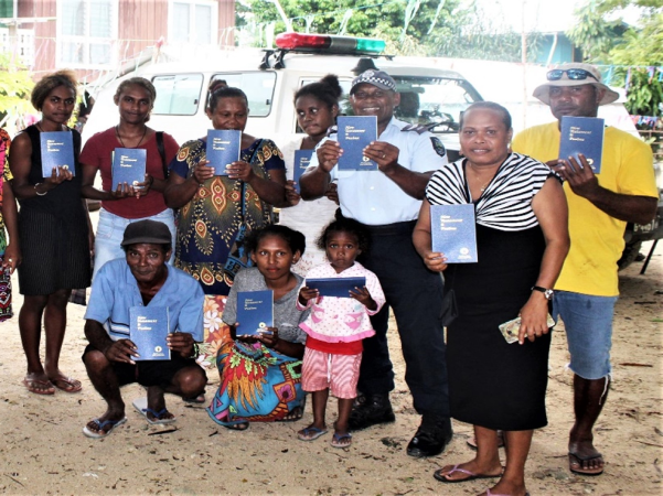 Sergeant Alego conducts policing, Bible distribution together