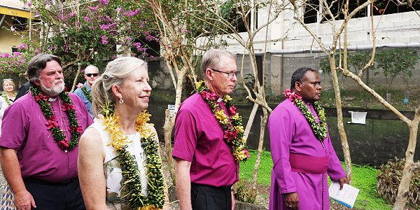 The Archbishop of the Anglican Church of Melanesia, The Most Rev Dawea (front right end) leading the regional delegates to the meeting venue.