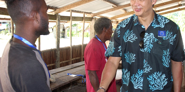 EU Ambassador H.E Sujiro Seam meet with a community member of Longapolo.