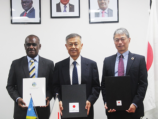 Minister of Foreign Affairs and External Trade, Hon. Jeremiah Manele, Ambassador of Japan to the Solomon Islands, His Excellency Miwa Yoshiaki and Takeshi Watanabe Resident Representative of JICA Solomon Islands after the signing of the Exchange of Notes on Friday.