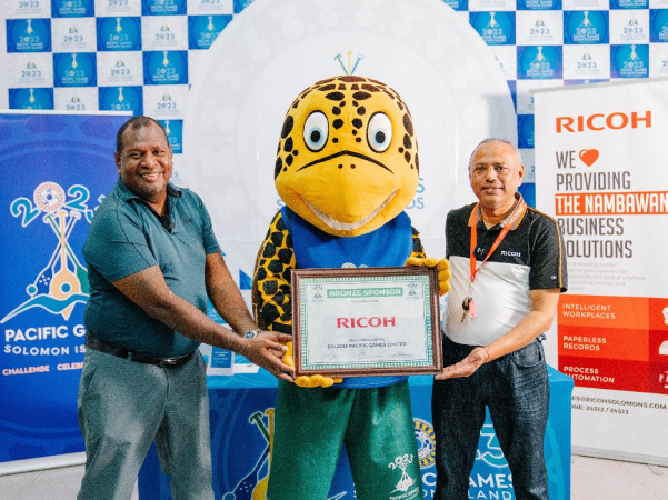GOC Board Chairman Martin Rara, SOLO the games Mascot and Director for Ricoh Mr. Pradeep Narayan with the certificate of being the Games Printing Partner for sol2023 Pacific games.