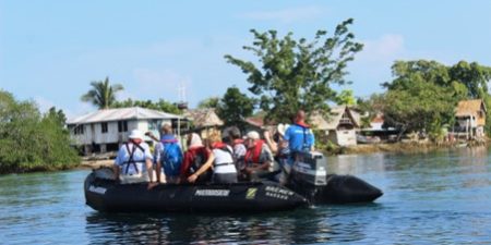 Tourists-arriving-at-Busu-Cultural-Centre-for-a-previous-shell-money-making-festival
