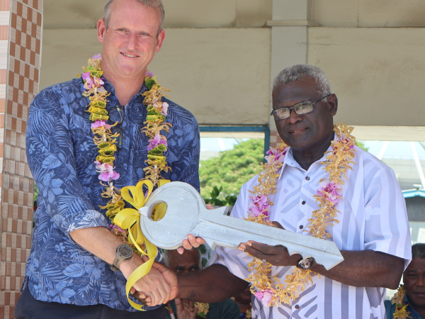 H.E Rod Hilton hands over key to PM Sogavare ( Minister of PG2023).