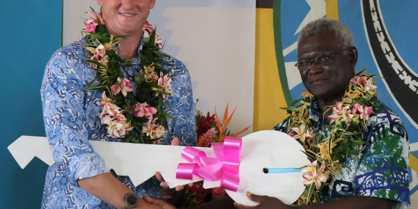 Key handover from H.E Hilton to PM and Minister of PG2023