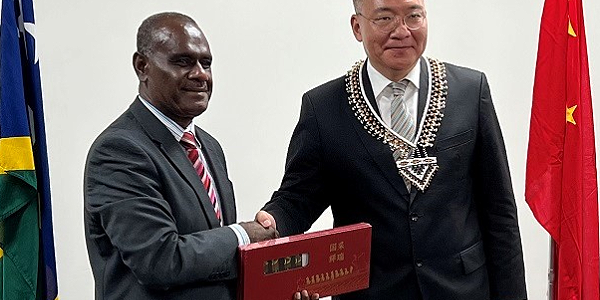 Minister of Foreign Affairs and External Trade Hon.Jeremiah Manele with Vice Minister of the International Department of the Central Committee of the Communist Party of China, His Excellency (HE) Guo Yezhou in Honiara.