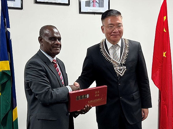 Minister of Foreign Affairs and External Trade Hon.Jeremiah Manele with Vice Minister of the International Department of the Central Committee of the Communist Party of China, His Excellency (HE) Guo Yezhou in Honiara.