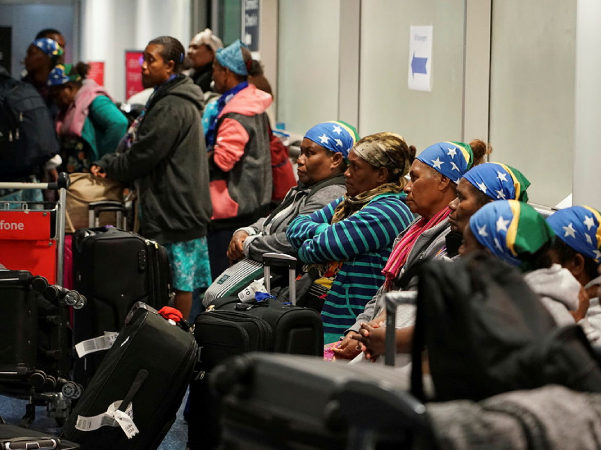 Part of the group of 65 Solomon Islanders who arrived safely in Sydney on 18 October.