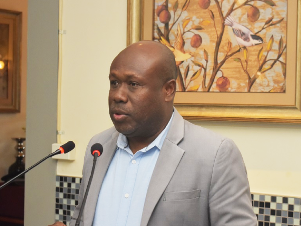 Minister of Police, National Security and Correctional Service (MPNSC), Honourable Anthony Veke giving his remarks during the luncheon.