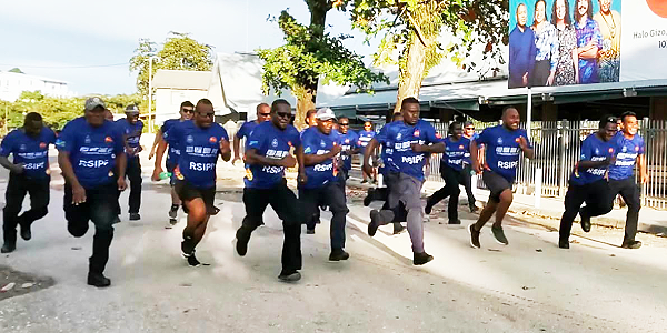 Officers in the 100m sprint race.
