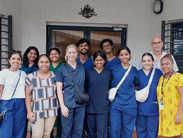 Most of the students with their supervisor and officials from the Australian High Commission office in Honiara. Photo supplied.