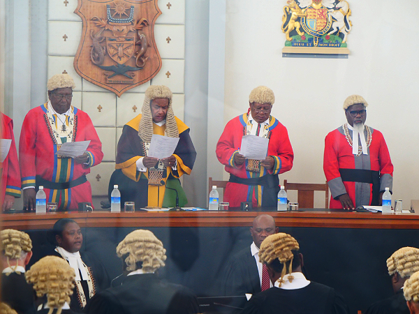 From left: Justice Leonard Maina, Chief Justice Sir Albert Palmer, Justice Emmanuel Kouhota and Justice Ronald Bei Talasasa Jr at yesterday’s opening of the 2024 Legal Year. Photo by IAN LADDS.