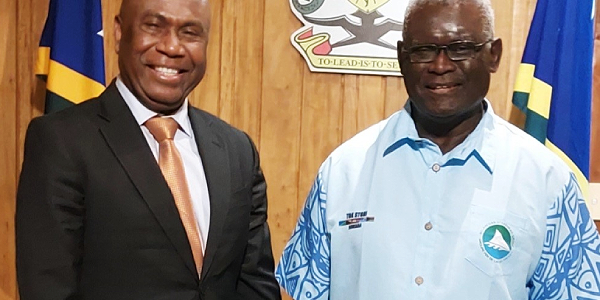 Caretaker PM Sogavare (right) and Ambassador Mose.