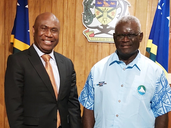 Caretaker PM Sogavare (right) and Ambassador Mose.
