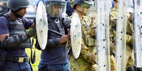 RSIPF alongside ADF personnel during the Public Order Management exercise. Photo, RSIPF.