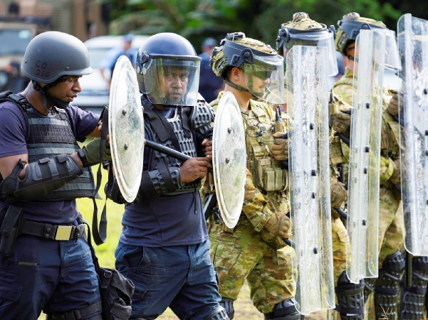 RSIPF alongside ADF personnel during the Public Order Management exercise. Photo, RSIPF.