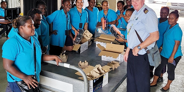 Customs officers undertaking practical x-ray training and examining goods. Photo, AHC.
