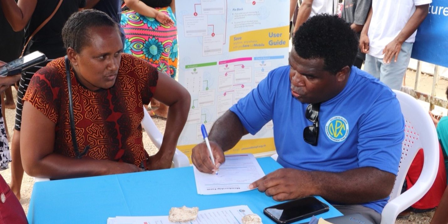 A female signs up as a youSave member during last week’s outreach program in Auki.