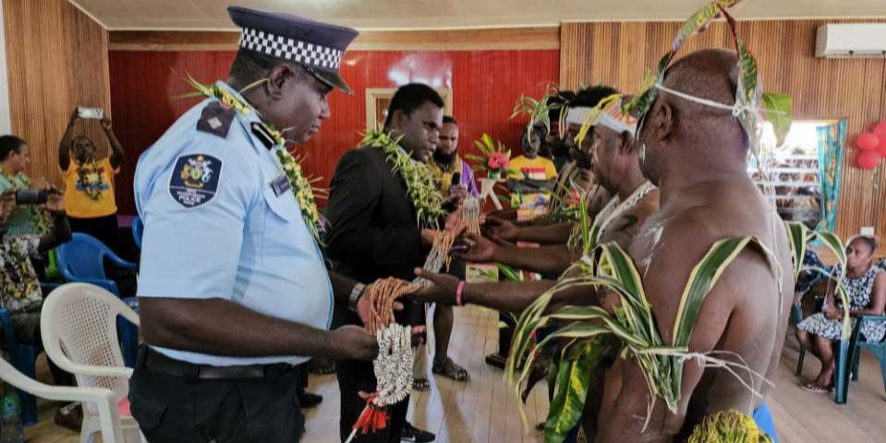 Leaders of the Malaita Community in Taro presenting a Tafuliae (shell money) to Choiseul Premier Harrison Pitakaka and the Choiseul Provincial Police Commander