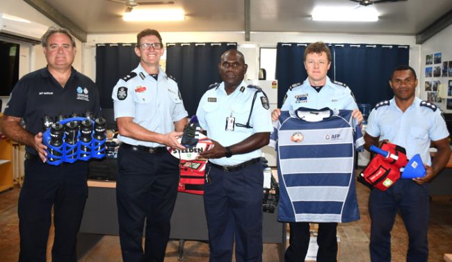 RAPPP, AFP and SIAF who delivered the gift to the RSIPF Royals Rugby Union team. RSIPF Assistant Commissioner, Simpson Pogeava, receiving the gift on behalf of the RSIPF Royals Rugby Union team.