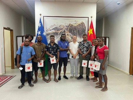 The students executive with a Chinese official
