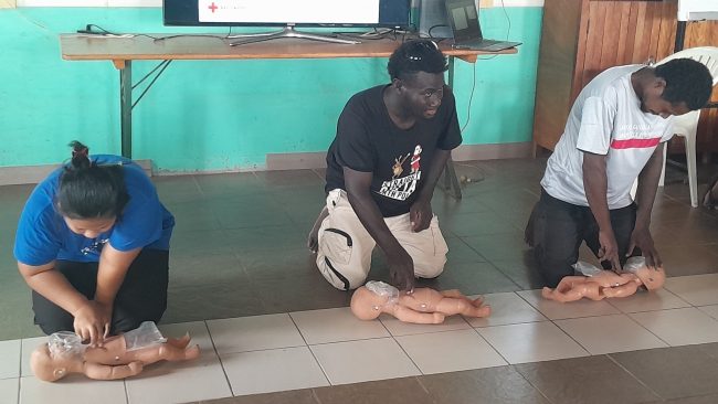 A demonstration on how to perform first aid. Photo Red Cross