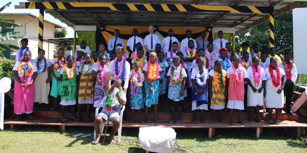 A group photo of the candidates with the church officials
