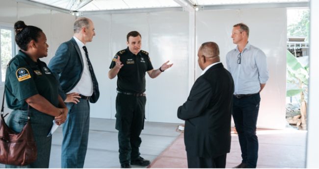 Australian High Commissioner Rod Hilton and Governor General Reverend David Tiva Kapu with the members of the St John Ambulance