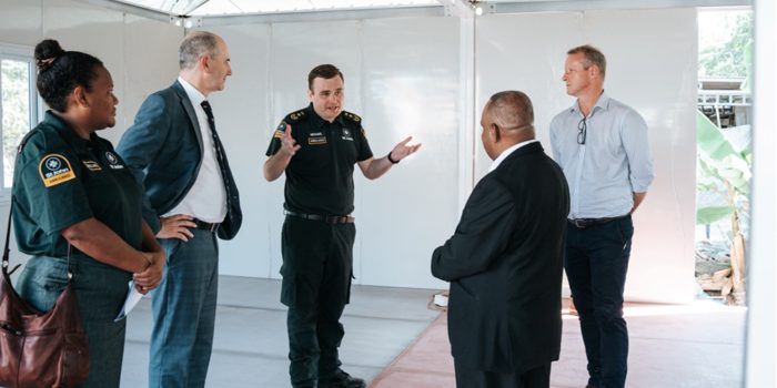 Australian High Commissioner Rod Hilton and Governor General Reverend David Tiva Kapu with the members of the St John Ambulance