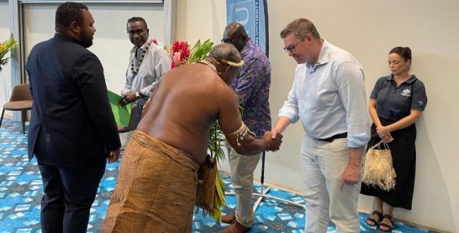 Australia’s Pat Conroy accorded a traditional Guadalcanal welcome on his arrival at SINU