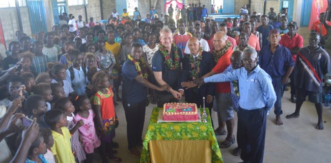 Cutting of the cake to mark the handing over of the Nila Tower from the Australian Government