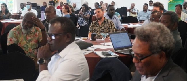 Government officials and donor representatives at the dialogue