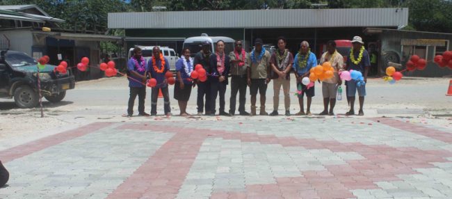 Guests cutting the ribbon to mark the completion and handing over of the IBP project to Auki Community High School