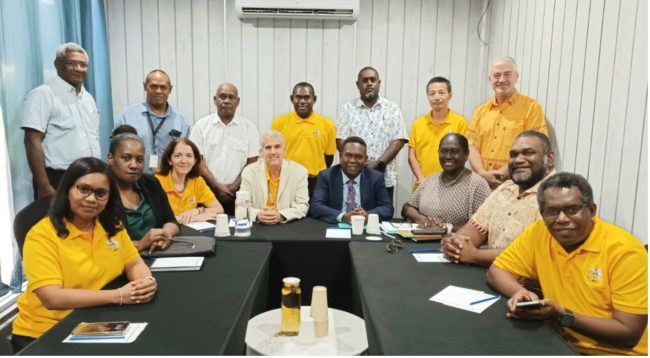 MHMS Supervising Minister the Hon Wayne Ghemu and MHMS Executive along with WHO Country Rep Dr Sobel