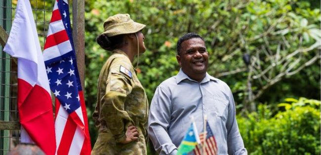 Minister Mahaga talking with Private Jess Sami at The Peter Joseph Museum, Munda