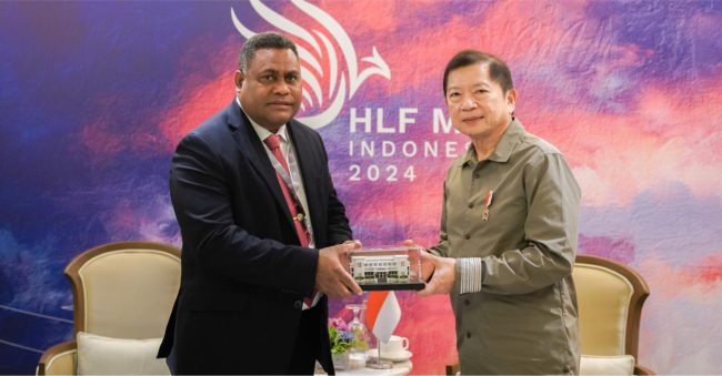 Minister Ramofafia receives gift from his Indonesian counterpart copy